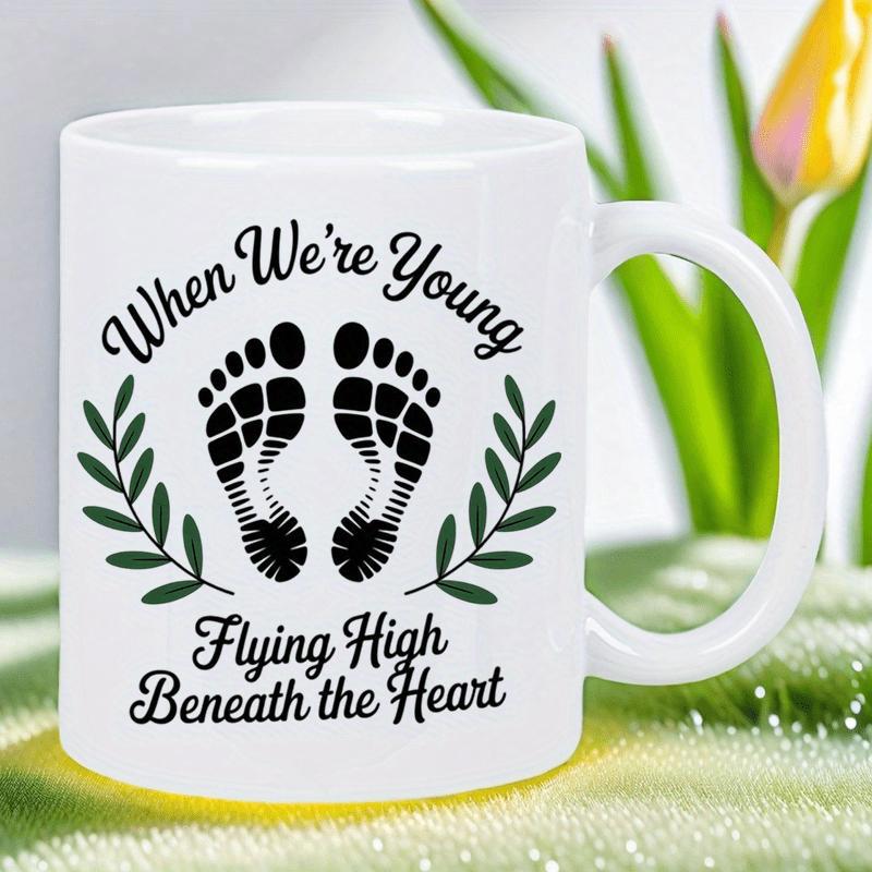 Tailorly White Ceramic 11 oz Mug - When Were Young Flying High Beneath The Heart Two Tiny Baby Footprints Framed By Elegant Green Leafy Branches Symmetrical