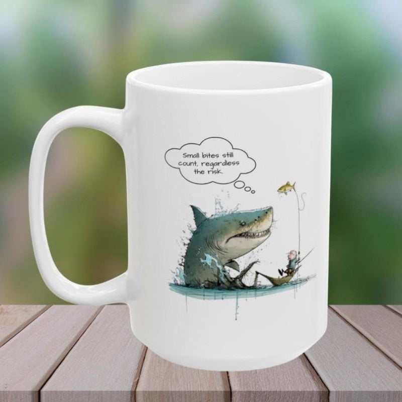 Tailorly White Ceramic 11 oz Mug - Small Bites Still Count Regardless The Risk Cartoon Shark Emerging From Water Looking At Tiny Golden Bait Shark