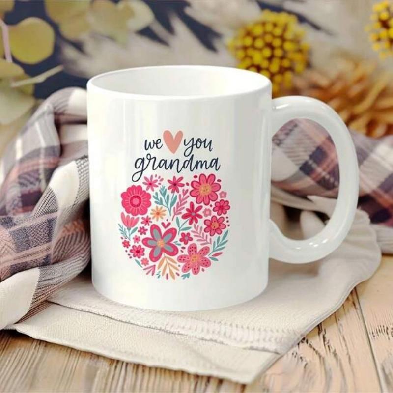Tailorly White Ceramic 11 oz Mug - We Love You Grandma Vibrant Colorful Flowers Arranged In A Circular Pattern With Heart Floral Bouquet