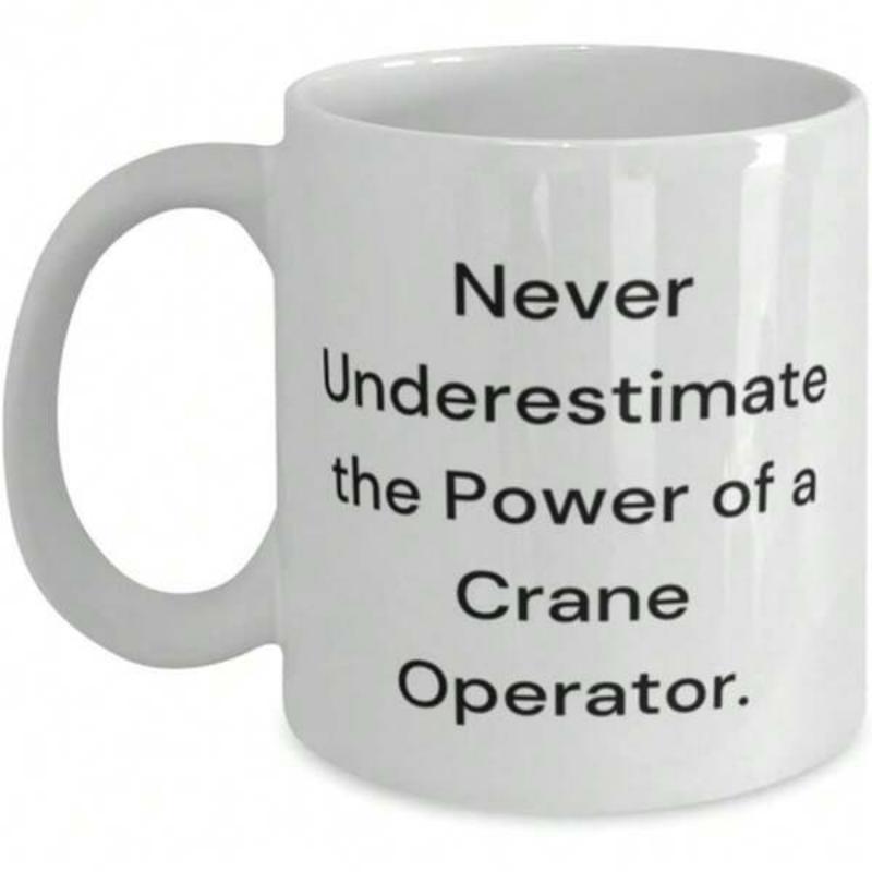 Tailorly White Ceramic 11 oz Mug - Never Underestimate The Power Of A Crane Operator Minimalist Clean Typography Featuring Bold Black Lettering On A Plain Surface