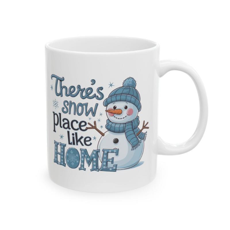 Tailorly White Ceramic 11 oz Mug - Theres Snow Place Like Home Smiling Winter Character Wearing Blue Knit Hat And Scarf Snowman