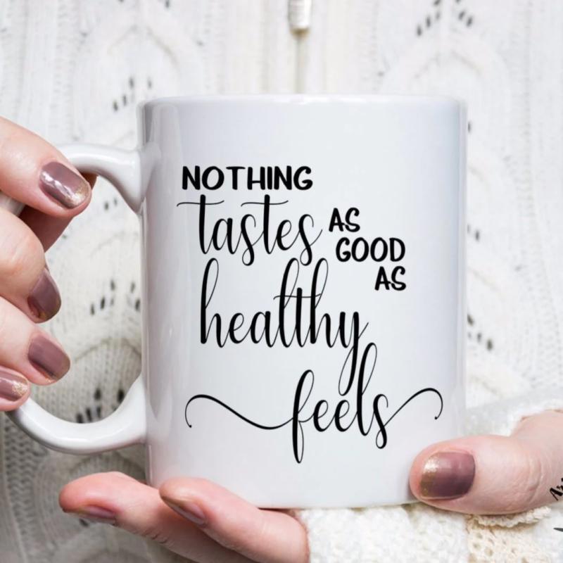Tailorly White Ceramic 11 oz Mug - Nothing Tastes As Good As Healthy Feels Minimalist White Ceramic Vessel Held By Person With Delicate Soft Grip Mug