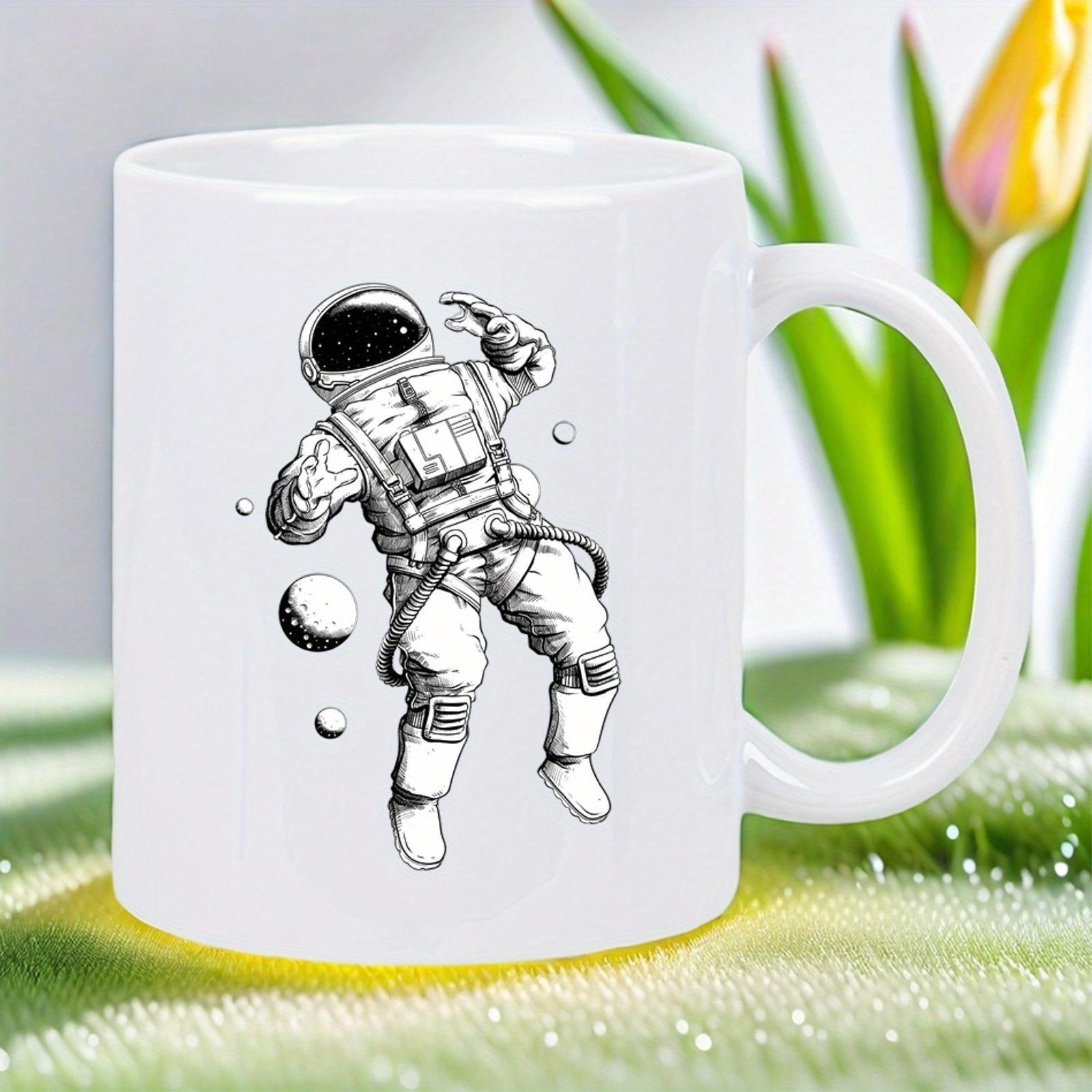Tailorly White Ceramic 11 oz Mug - Floating Through The Vast Galaxy Among Distant Cosmic Planets In Deep Space Astronaut
