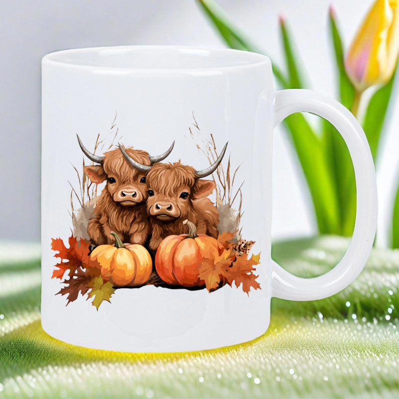 Tailorly White Ceramic 11 oz Mug - Adorable Furry Baby Calves Sitting Behind Rustic Harvest Pumpkins And Autumn Leaves Highland Cow