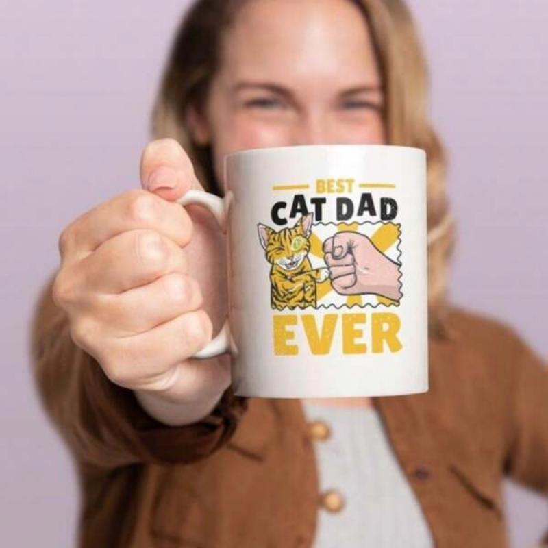 Tailorly White Ceramic 11 oz Mug - Best Cat Dad Ever Illustrated Orange Tabby Cat Bumping Fists With Human Hand Cat