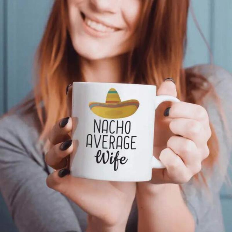 Tailorly White Ceramic 11 oz Mug - Nacho Average Wife Traditional Mexican Sombrero With Vibrant Stripes Floating Above Playful Decorative Text Sombrero