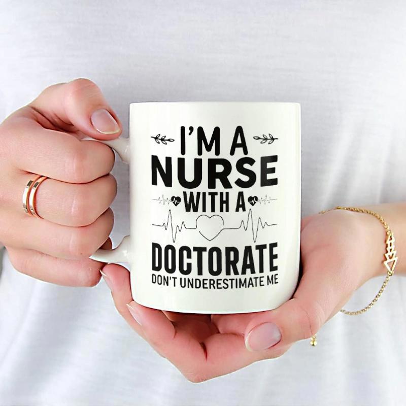 Tailorly White Ceramic 11 oz Mug - Im A Nurse With A Doctorate Dont Underestimate Me Heart Pulse Line With Decorative Leafy Flourishes And Professional Medical