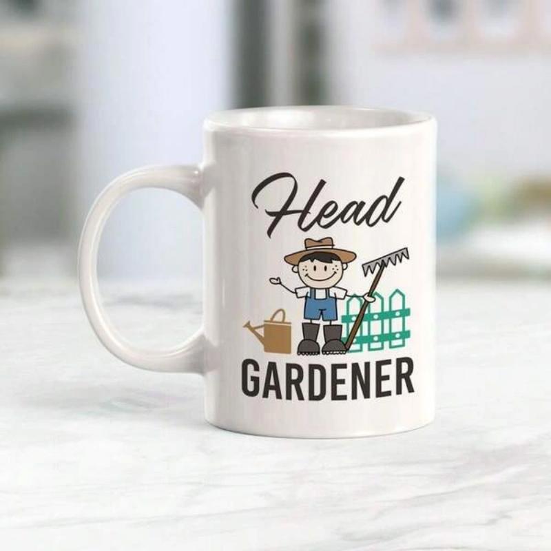 Tailorly White Ceramic 11 oz Mug - Head Gardener Smiling Boy In Overalls Holding Rake Beside Watering Can And Fence Gardener