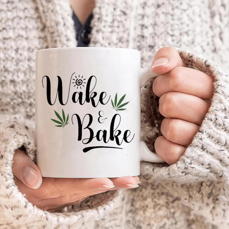 Tailorly White Ceramic 11 oz Mug - Wake Bake Stylized Script Text With Vibrant Green Cannabis Leaves And Sun Leaf