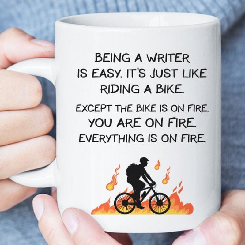 Tailorly White Ceramic 11 oz Mug - Being A Writer Is Easy Its Just Like Riding A Bike Except The Bike Is On Fire You Are On Fire Everything Is On Fire Silhouette