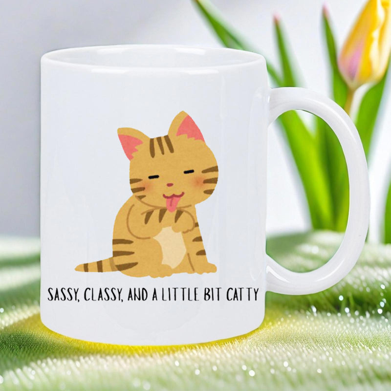 Tailorly White Ceramic 11 oz Mug - Sassy Classy And A Little Bit Catty Cute Orange Tabby Sitting And Grooming Its Paw With A Playful Expression Cat