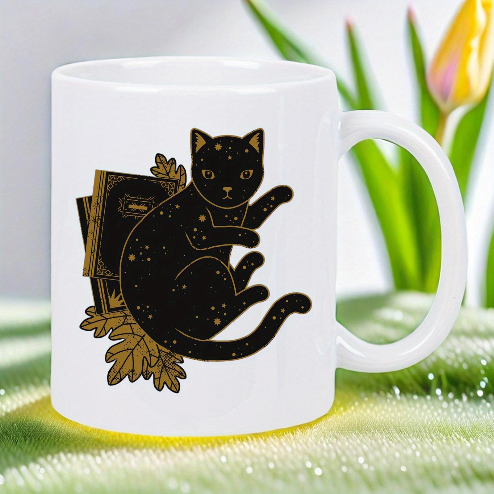 Tailorly White Ceramic 11 oz Mug - Mystical Black Celestial Starry Fur Resting Against Vintage Books And Leaves Cat
