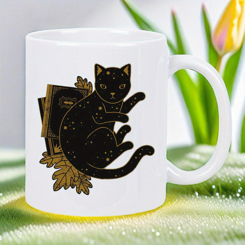 Tailorly White Ceramic 11 oz Mug - Mystical Black Celestial Starry Fur Resting Against Vintage Books And Leaves Cat