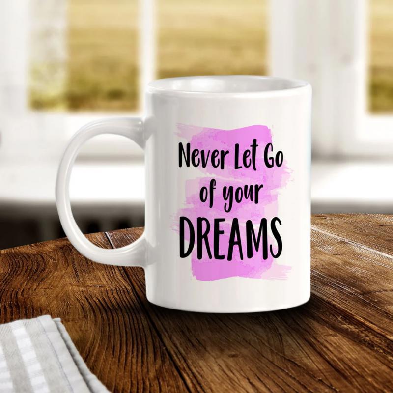 Tailorly White Ceramic 11 oz Mug - Never Let Go Of Your Dreams Pink Watercolor Splatter Behind Inspirational Quote On A Ceramic