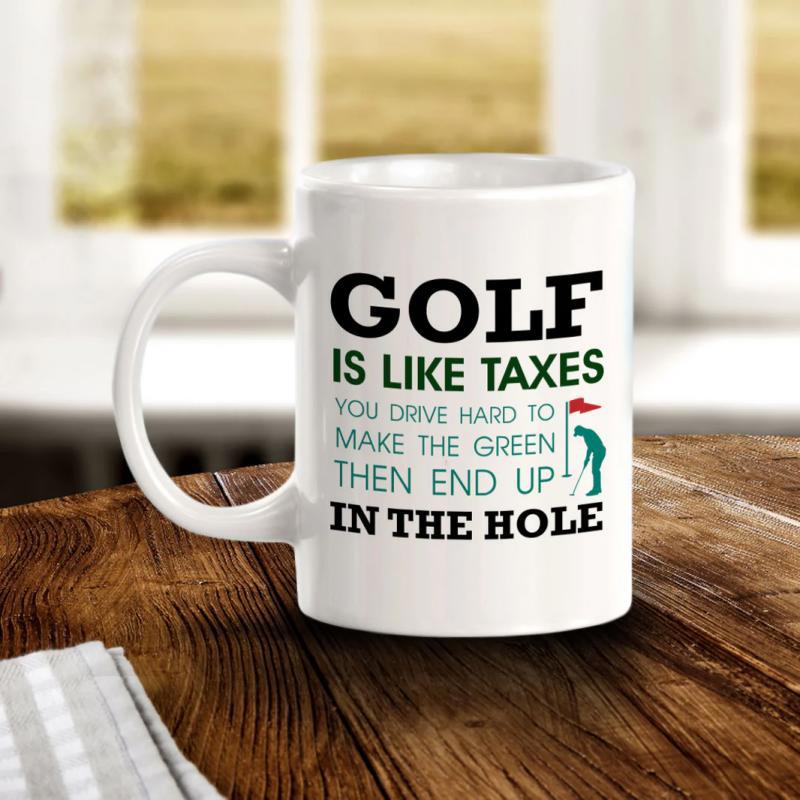 Tailorly White Ceramic 11 oz Mug - Golf Is Like Taxes You Drive Hard To Make The Green Then End Up In The Hole Silhouette Of A Professional Player Putting On A