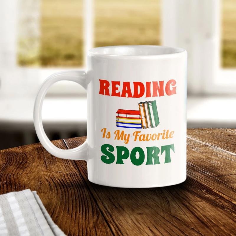 Tailorly White Ceramic 11 oz Mug - Reading Is My Favorite Sport Stack Of Colorful Books Arranged Neatly On Surface Book