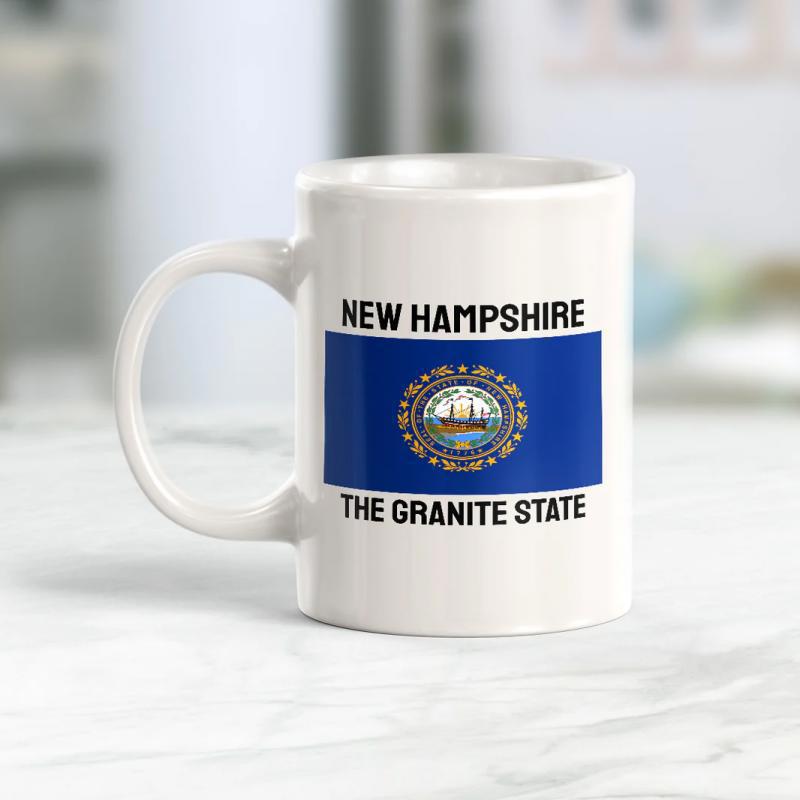 Tailorly White Ceramic 11 oz Mug - New Hampshire The Granite State Blue Flag Featuring A Circular Gold Seal With Ship Among Stars Mug