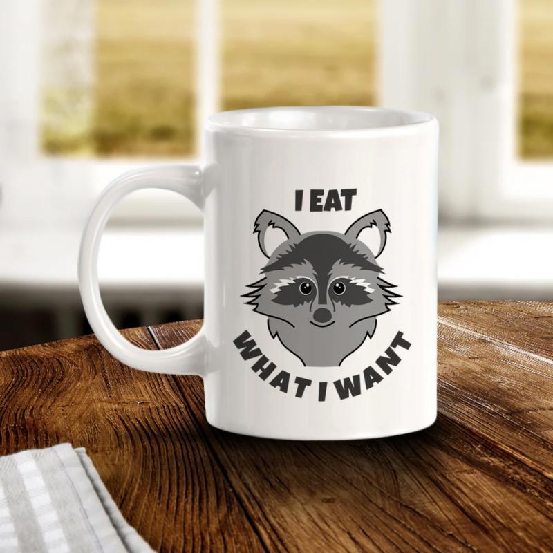 Tailorly White Ceramic 11 oz Mug - I Eat What I Want Adorable Gray Raccoon Face Centered On A Mug
