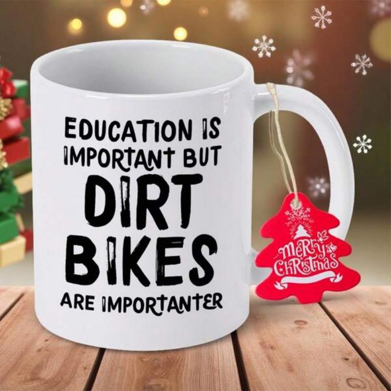 Tailorly White Ceramic 11 oz Mug - Education Is Important But Dirt Bikes Are Importanter Minimalist White Ceramic Cup Resting On A Rustic Wooden Surface Mug