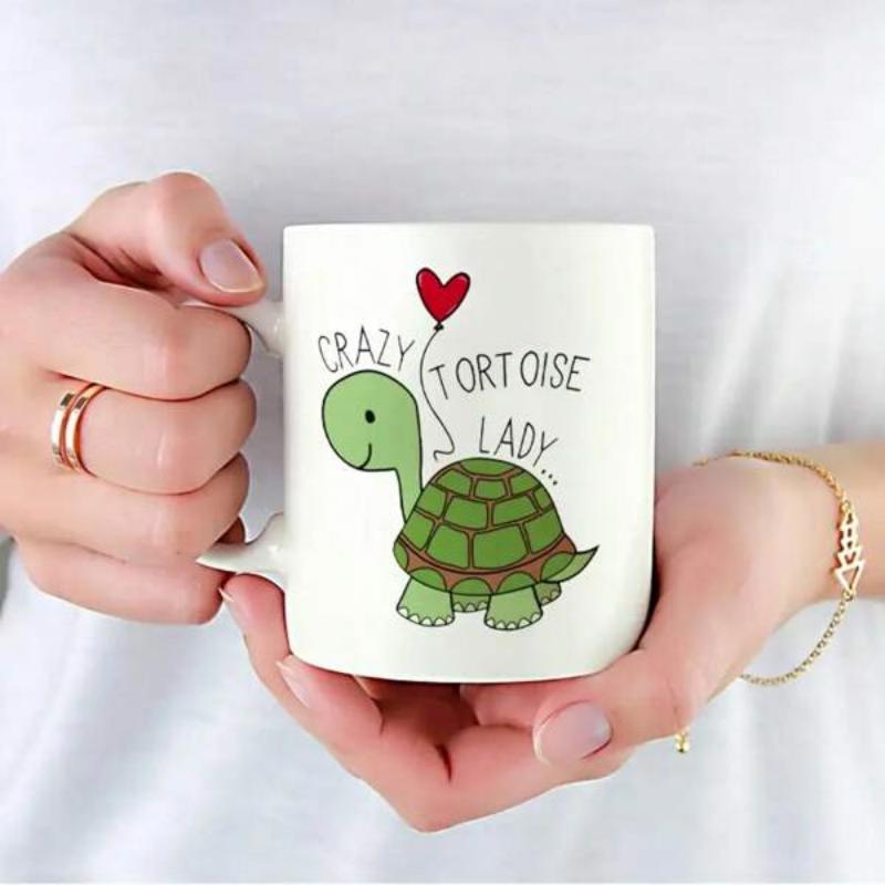 Tailorly White Ceramic 11 oz Mug - Crazy Tortoise Lady Cute Smiling Green Reptile Holding Small Red Heart Balloon Tortoise