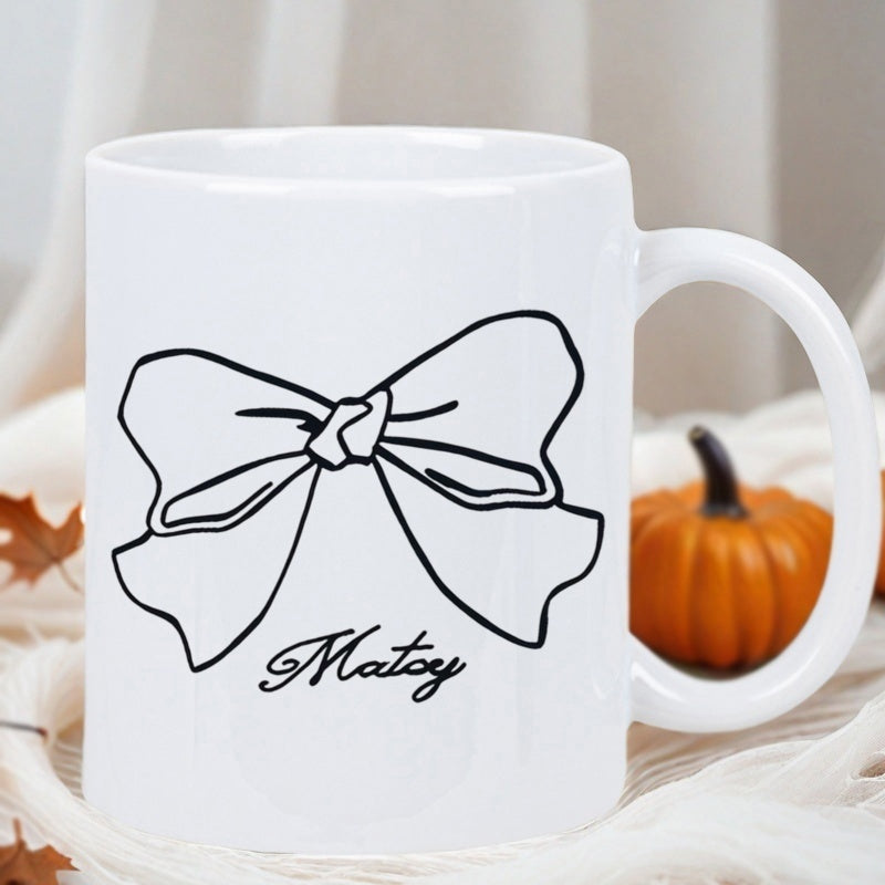 Tailorly White Ceramic 11 oz Mug - Matcy Simple Minimalist Hand Drawn Ribbon Outlined With Flowing Curves Bow
