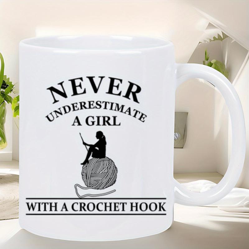 Tailorly White Ceramic 11 oz Mug - Never Underestimate A Girl With A Crochet Hook Elegant Silhouette Resting Upon A Large Textured Sphere Of Yarn Girl