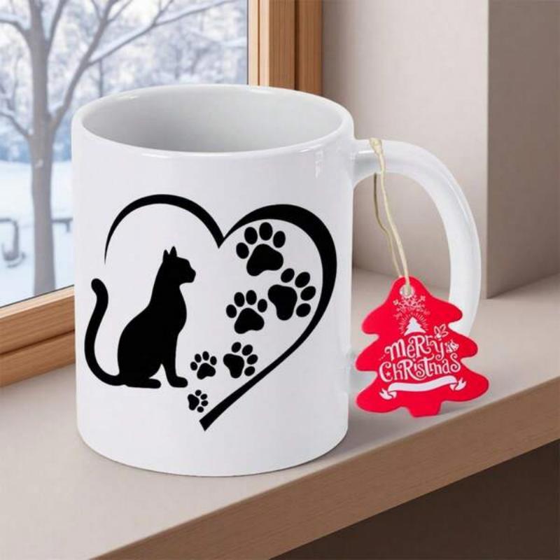 Tailorly White Ceramic 11 oz Mug - Merry Christmas Minimalist Heart Silhouette With Paw Prints Beside A Sitting Pet Cat