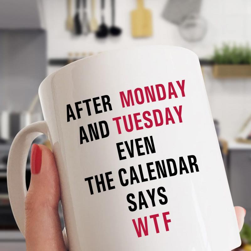Tailorly White Ceramic 11 oz Mug - After Monday And Tuesday Even The Calendar Says Wtf Minimalist Ceramic With Bold Typography Against Blurred Kitchen Background