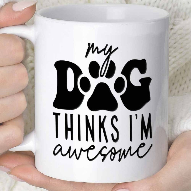 Tailorly White Ceramic 11 oz Mug - My Dog Thinks I'm Awesome Minimalist Black Metal Cutout Featuring Sentimental Script Within Artistic Graphic Paw