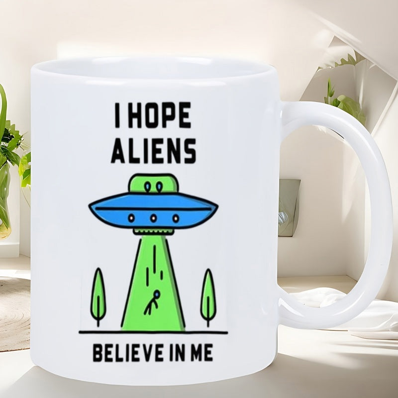 Tailorly White Ceramic 11 oz Mug - I Hope Aliens Believe In Me Vibrant Blue Flying Saucer Beaming Green Light Over Trees And Stick Figure UFO