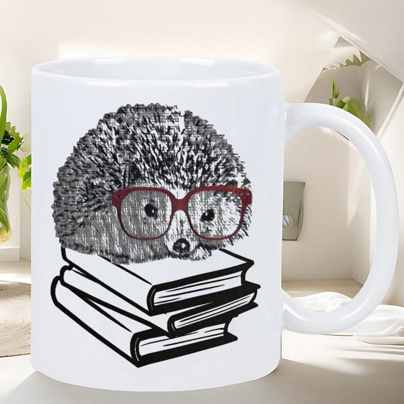 Tailorly White Ceramic 11 oz Mug - Studious Little Hedgehog Wearing Red Glasses Resting On Stack Of Books Hedgehog