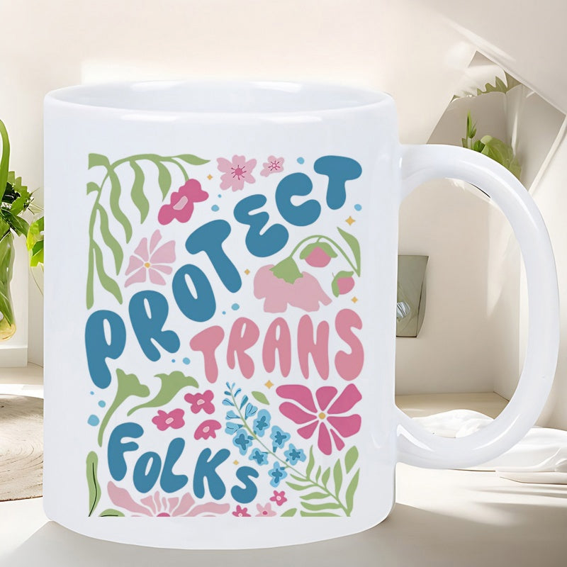 Tailorly White Ceramic 11 oz Mug - Protect Trans Folks Colorful Retro Bubble Letters Surrounded By Delicate Hand Drawn Garden Flowers