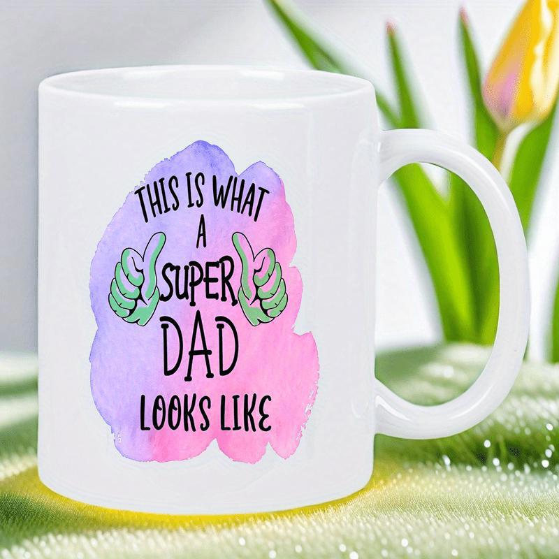 Tailorly White Ceramic 11 oz Mug - This Is What A Super Dad Looks Like Vibrant Colorful Watercolor Background With Two Green Thumbs Up Icons Mug