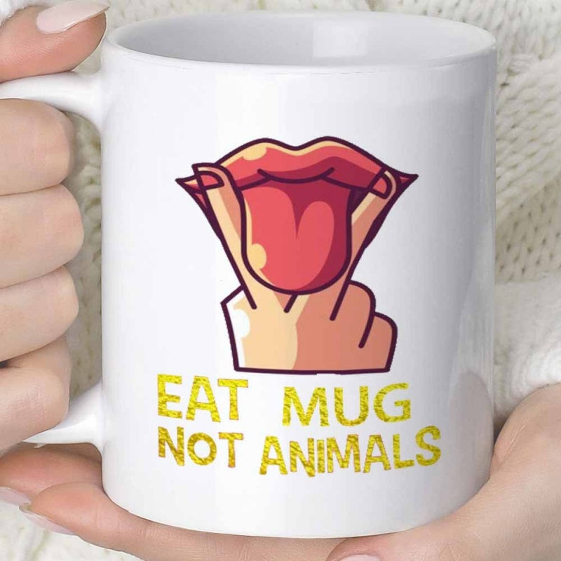 Tailorly White Ceramic 11 oz Mug - Eat Mug Not Animals Stylized Hand Gesturing Around Open Red Lips And A Protruding Pink Tongue Lips