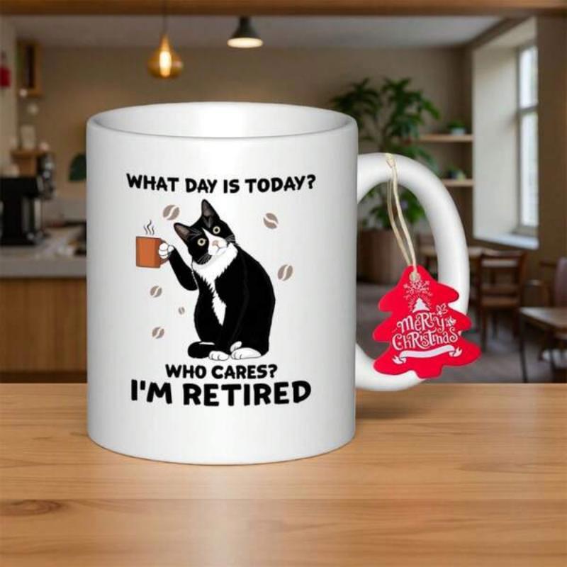 Tailorly White Ceramic 11 oz Mug - What Day Is Today Who Cares Im Retired Tuxedo Cat Sitting Peacefully Holding A Small Steaming Coffee Mug Cat