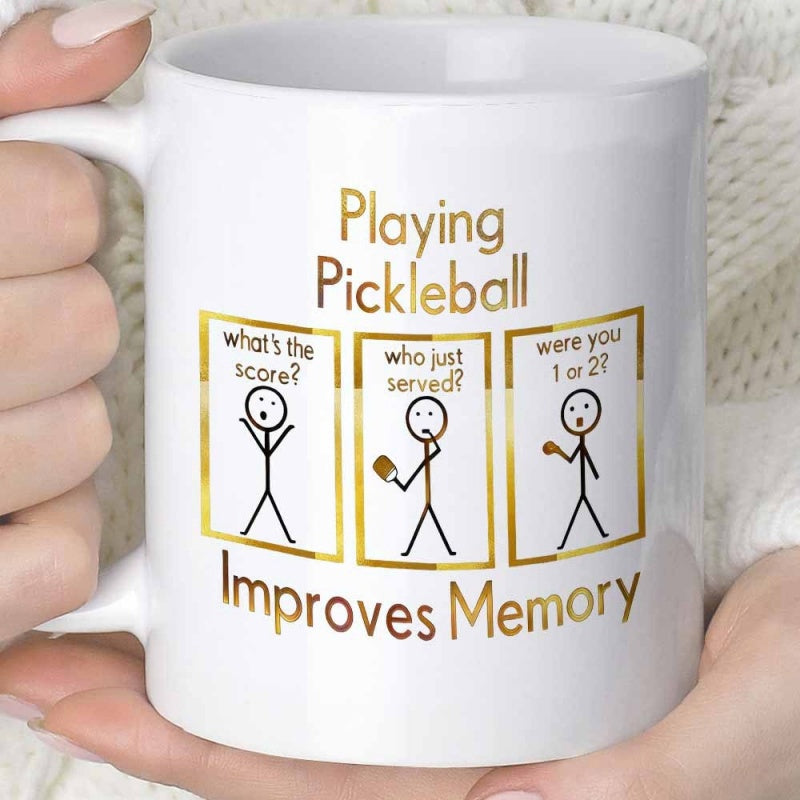 Tailorly White Ceramic 11 oz Mug - Playing Pickleball Improves Memory Three Golden Rectangles Featuring Humorous Stick Figures Playing A Competitive Game