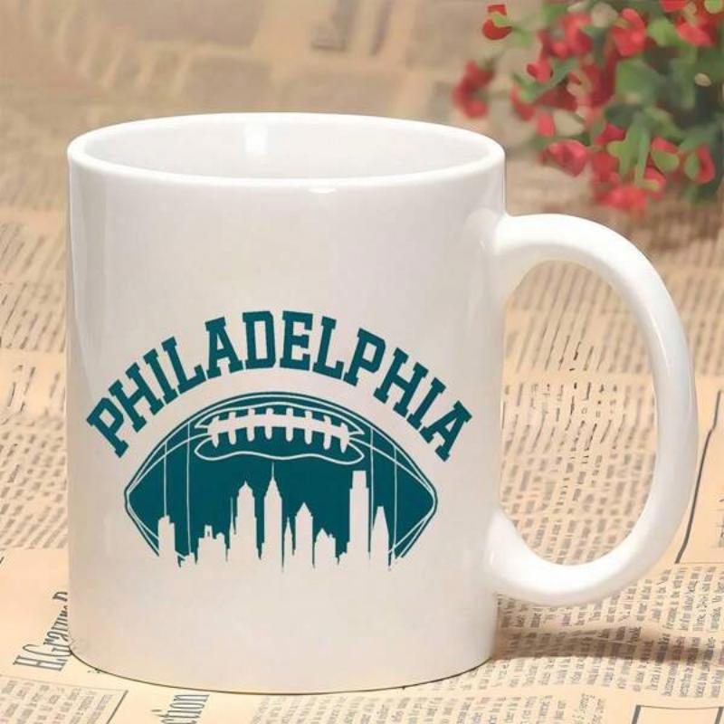 Tailorly White Ceramic 11 oz Mug - Philadelphia Arched Text Over Sporty City Skyline Detailed Athletic Football