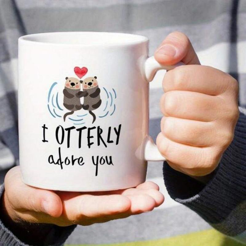 Tailorly White Ceramic 11 oz Mug - I Otterly Adore You Two Hand Holding Otters Floating In Rippling Water With Red Heart Otter