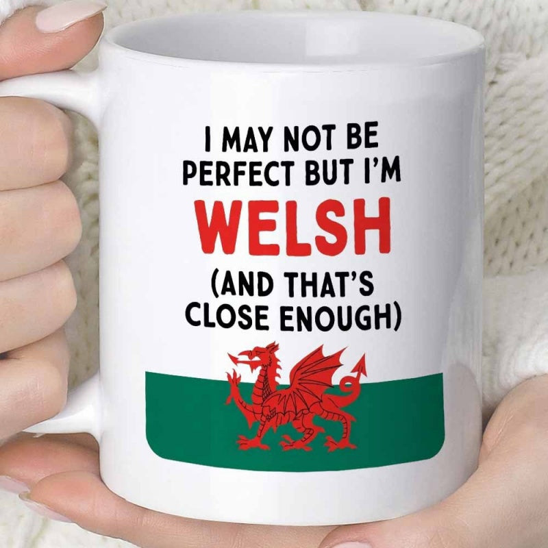 Tailorly White Ceramic 11 oz Mug - I May Not Be Perfect But I'm Welsh And That's Close Enough Vibrant Red Dragon Standing Above A Bold Green Horizontal Stripe
