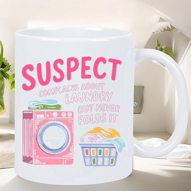 Tailorly White Ceramic 11 oz Mug - Suspect Complains About Laundry But Never Folds It Retro Styled Pink Graphic Design With A Full Colorful Laundry Basket Washing