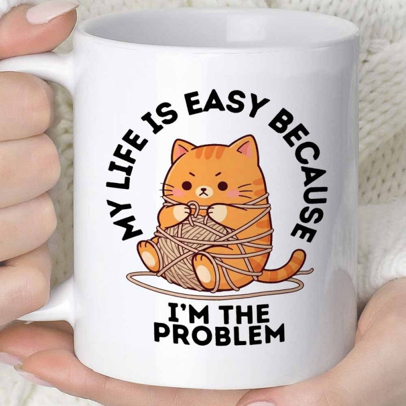 Tailorly White Ceramic 11 oz Mug - My Life Is Easy Because I'm The Problem Grumpy Orange Cat Tangled Among Messy Strands Of Brown Yarn Ball Cat