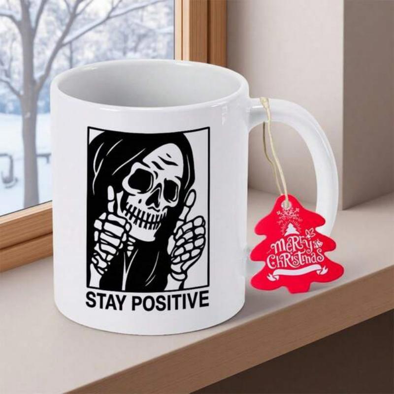 Tailorly White Ceramic 11 oz Mug - Stay Positive Cloaked Figure Holding Two Thumbs Up With A Cheerful Humorous Skeleton