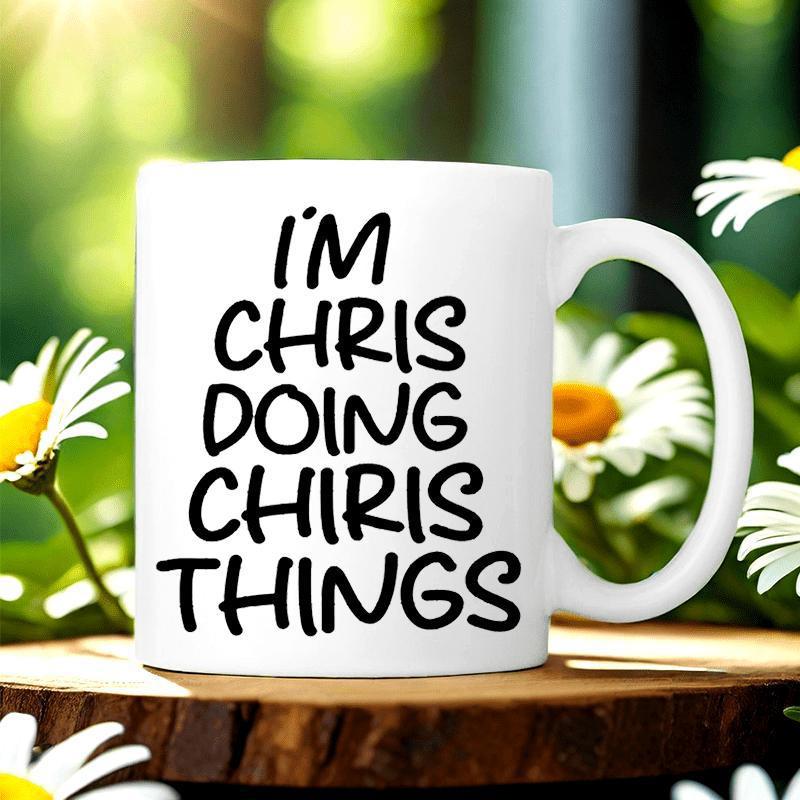 Tailorly White Ceramic 11 oz Mug - Im Chris Doing Chiris Things Minimalist Ceramic Vessel For Daily Coffee Sitting Among White Daisies Mug