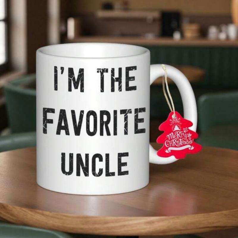Tailorly White Ceramic 11 oz Mug - Im The Favorite Uncle Minimalist White Ceramic Vessel Displaying Bold Distressed Typeface On Surface Mug