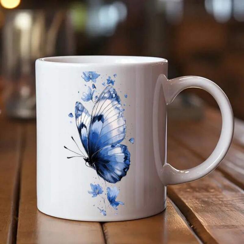 Tailorly White Ceramic 11 oz Mug - Vibrant Blue Watercolor Wings Flying Gracefully Among Delicate Floral Splatters Butterfly