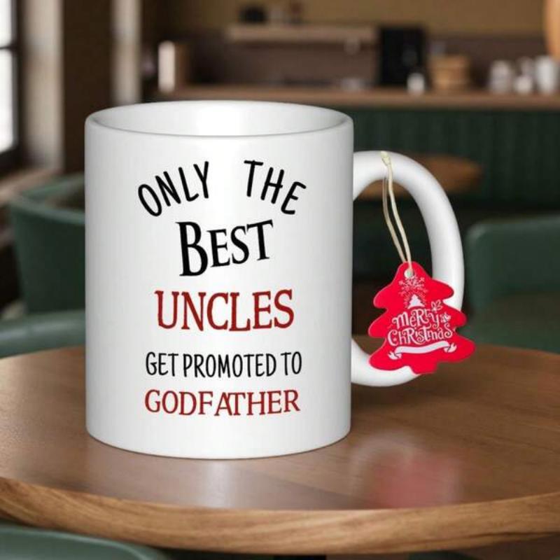 Tailorly White Ceramic 11 oz Mug - Only The Best Uncles Get Promoted To Godfather Classic White Ceramic Material Sitting On A Polished Wooden Surface Mug