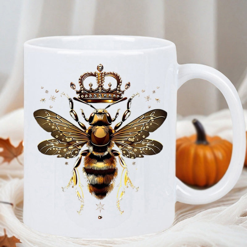 Tailorly White Ceramic 11 oz Mug - Elegant Golden Royal Crown Featuring Intricate Wings And Shimmering Details Bee