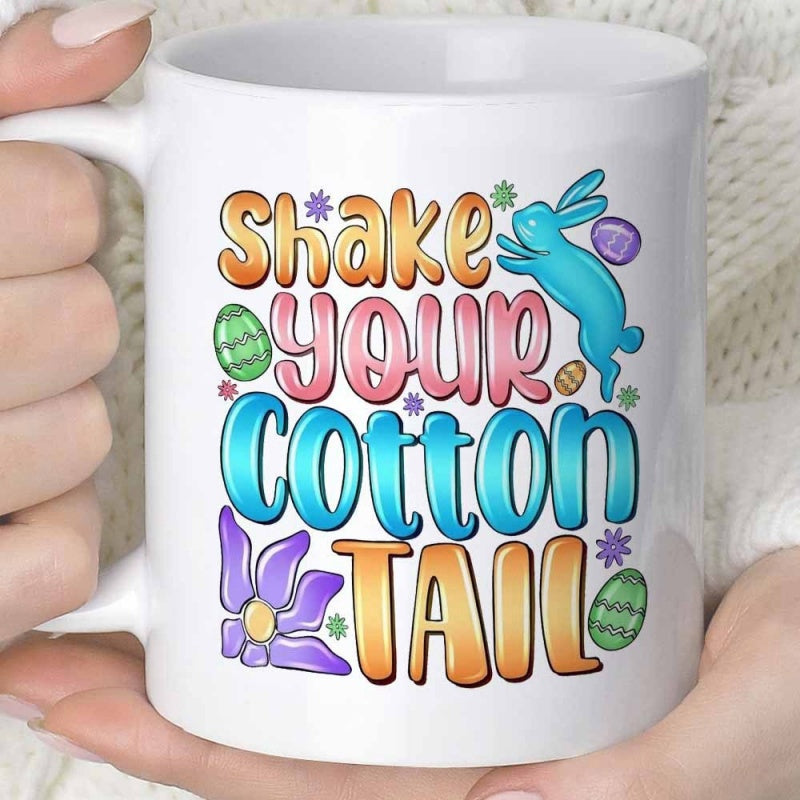 Tailorly White Ceramic 11 oz Mug - Shake Your Cotton Tail Playful Blue Jumping Bunny Surrounded By Colorful Easter Eggs And Flowers Rabbit