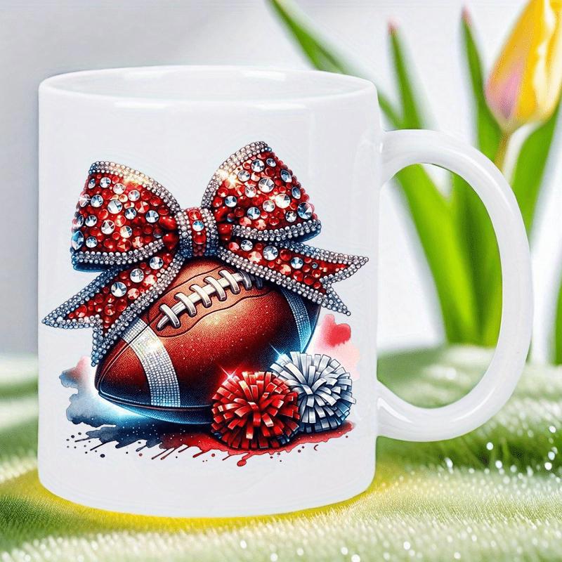 Tailorly White Ceramic 11 oz Mug - Sparkling Red Bow On Top Of Textured Football Beside Pom Poms Football