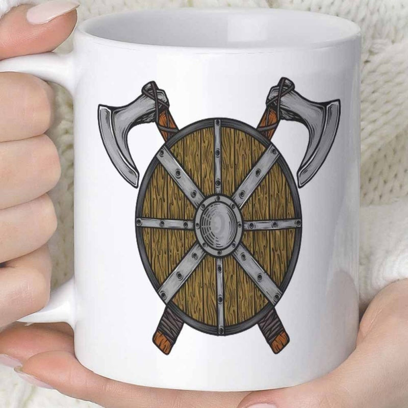Tailorly White Ceramic 11 oz Mug - Medieval Iron Battle Axes Crossed Behind A Rustic Circular Wooden Shield